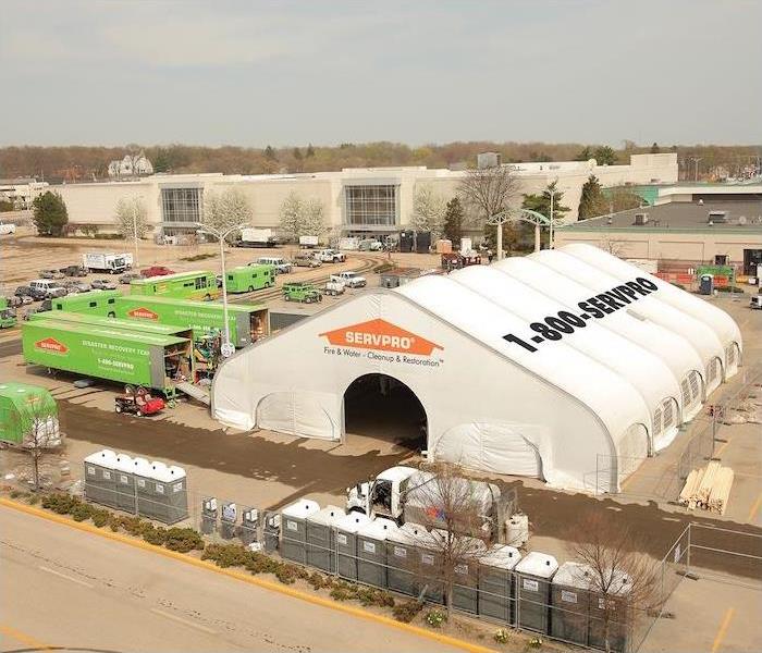 aerial view of a SERVPRO recovery pop-up location set up outside a shopping center 